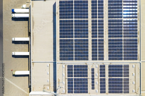 Fototapeta Industry with low carbon footprint. Industrial warehouses with solar panels on the roof. Technology park and factories from above