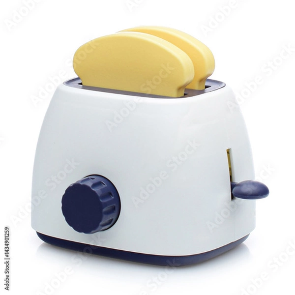 Obraz A plastic toy toaster with bread on a white background.