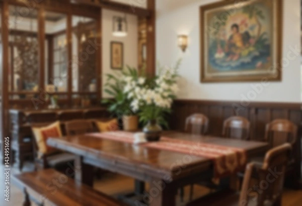 Fototapeta Blurry image of a restaurant interior.  javanesse restaurant interior. A blurred image of  a classic and elegant restaurant interior, perfect for background use or design elements. Blurred  background