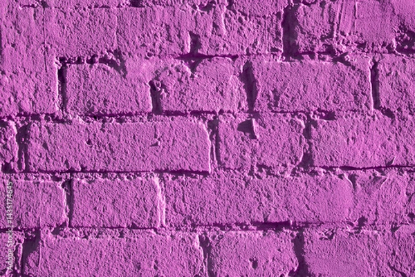 Obraz Fragment of brickwork, close-up. Brick wall, close-up. Potholes and defects in a brick wall, flat layout. Cracks and defects in bricks on a wall, color fantasy.