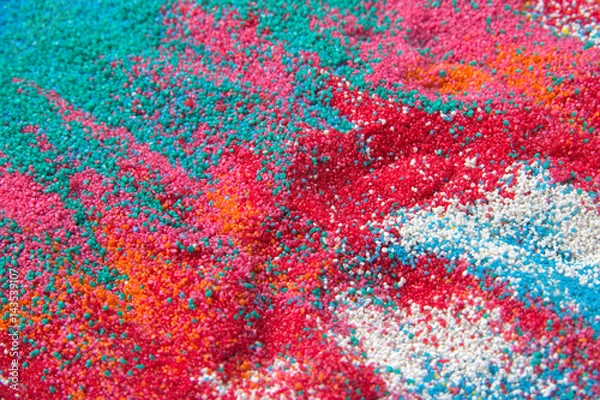 Fototapeta Background of colored sand closeup