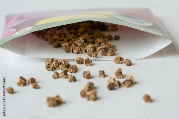 Fototapeta Colorful Mix of Beet Seeds Spilled from a Packet