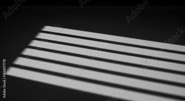 Fototapeta Window Blinds Creating Striped Shadows on Surface with Dark Background