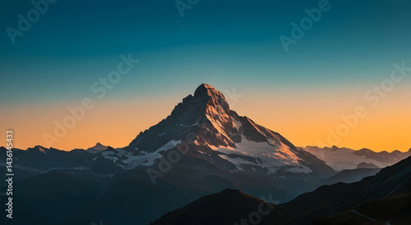Fototapeta Majestic Mountain Peak Bathed In The Warm Light Of Golden Hour Scenery