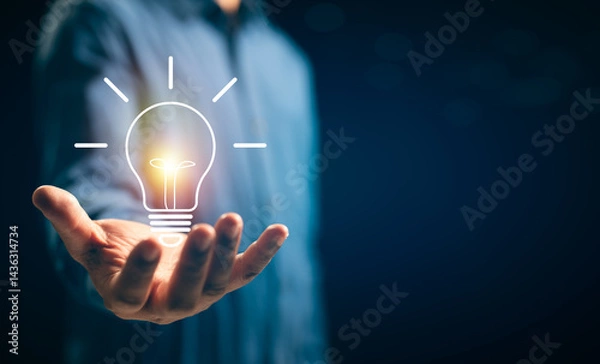 Fototapeta Businessman hands showing light bulb for thinking new idea concept. Innovative technology with innovation. Inspiration of ideas for sustainable business development and communication concepts