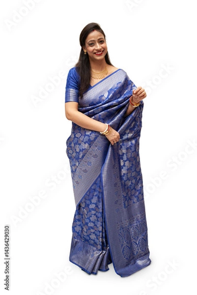Obraz A joyful Bengali Indian woman from India is laughing while dressed in a beautiful traditional saree.