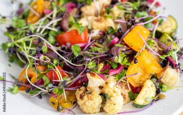 Obraz Close up of Roasted Vegetable Salad with Fresh Herbs and Sprouts