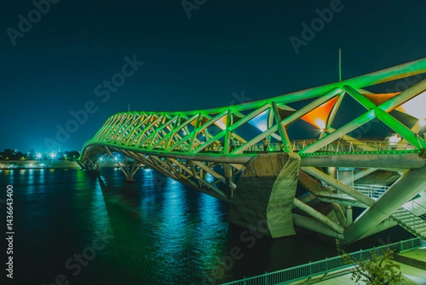 Fototapeta Atal Bridge is a pedestrian triangular truss bridge at Sabarmati Riverfront on Sabarmati River in Ahmedabad, Gujarat. Its design is inspired by kites and was inaugurated in 2022