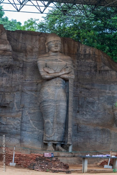 Fototapeta Gal Vihara, four magnificent Buddha statues carved from a single granite slab in ancient Polonnaruwa, Sri Lanka
