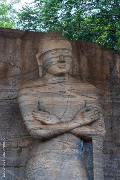 Fototapeta Gal Vihara, four magnificent Buddha statues carved from a single granite slab in ancient Polonnaruwa, Sri Lanka