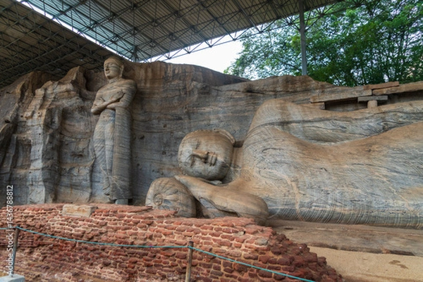 Fototapeta Gal Vihara, four magnificent Buddha statues carved from a single granite slab in ancient Polonnaruwa, Sri Lanka