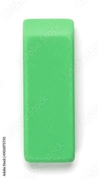 Fototapeta Green eraser against white background, a simple rectangular object for removing pencil marks. A common and essential stationery item.