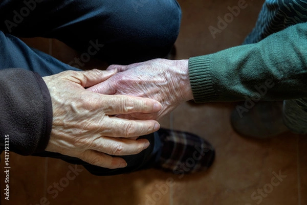 Fototapeta Close-Up of Elderly Hands Holding in Comforting and Supportive Gesture