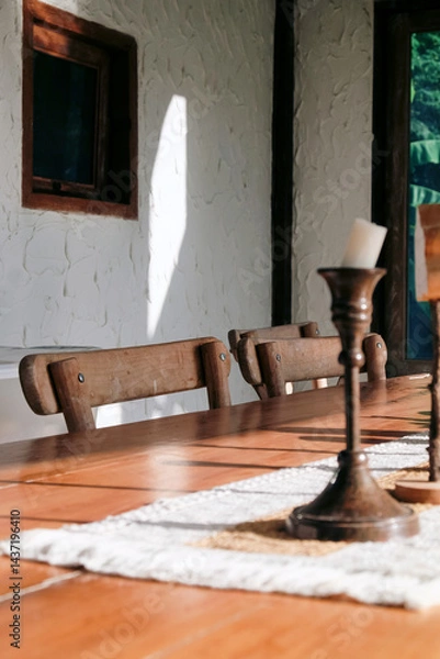Obraz detail of Wooden table and chair in the interior of a country house.