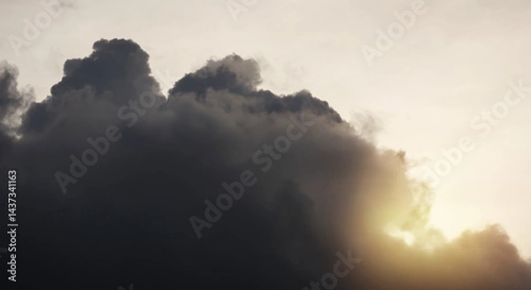 Fototapeta Aerial view closeup on storm dark clouds with dramatic sunset atmosphere on spring season.Image use for meteorology report and presentation background.
