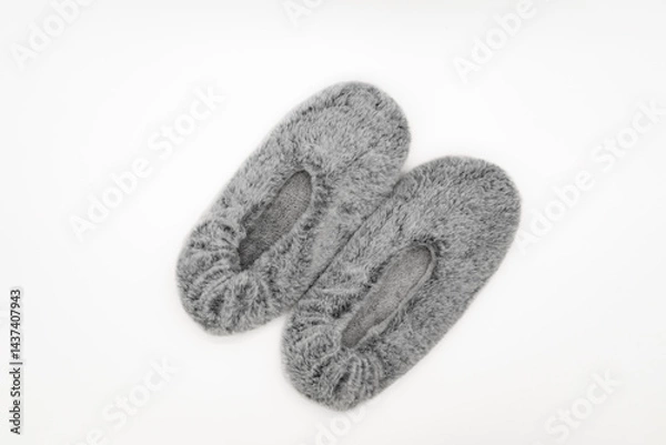 Obraz Fluffy gray home slippers isolated on white background. Bed shoes accessory footwear. Top view or flat lay.