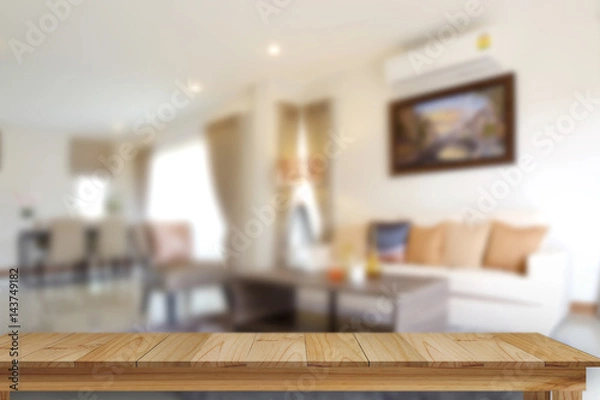 Fototapeta Empty wood table space platform and living room background.  Product display montage Concept.