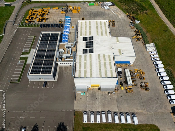 Fototapeta Solar powered construction machinery distribution and service center. Aerial view