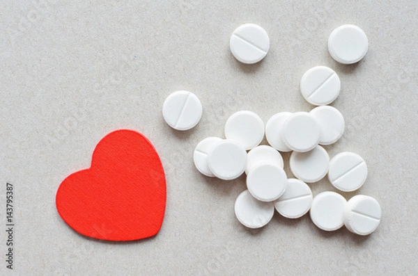 Obraz white tablets with red heart