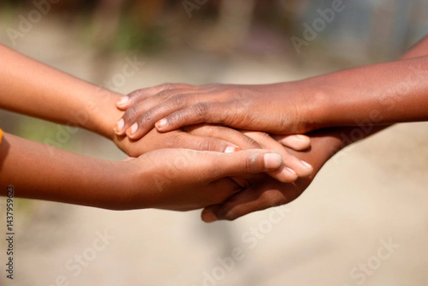 Fototapeta Many hands joined together for a partnership