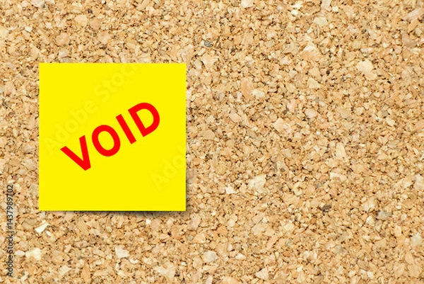 Fototapeta Yellow note paper with word void on cork board background with copy space