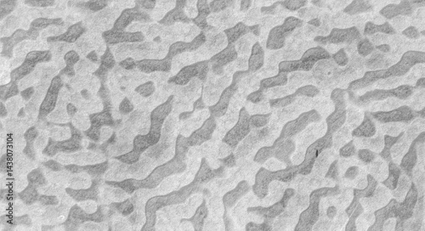 Fototapeta Soft wavy lines background in light gray tones, giving a calm and natural feeling. The surface has a fine texture like sand or terrazzo. For simple, natural, minimalist designs, prints, posters.