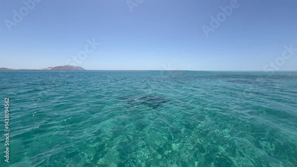 Fototapeta The transparent sea is an amazing natural phenomenon of the health of the marine ecosystem. In such seas, you can see the bottom at depths of up to 30-40 m, and in the clearest waters - at a record 80