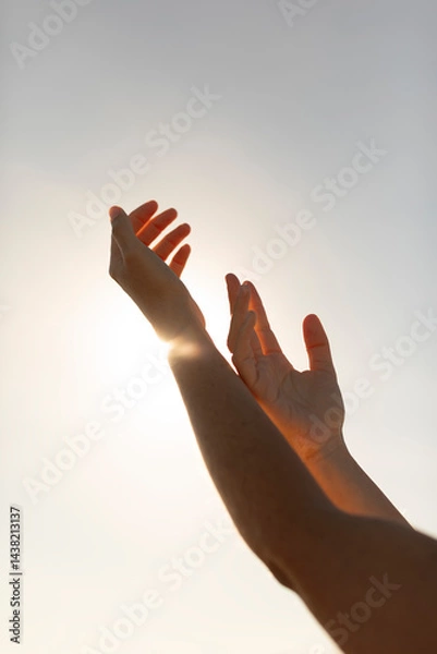 Obraz The silhouette of a young woman's hands, seem to dance as they caress each other under the rays of the afternoon sun, Mediterranean, Spain