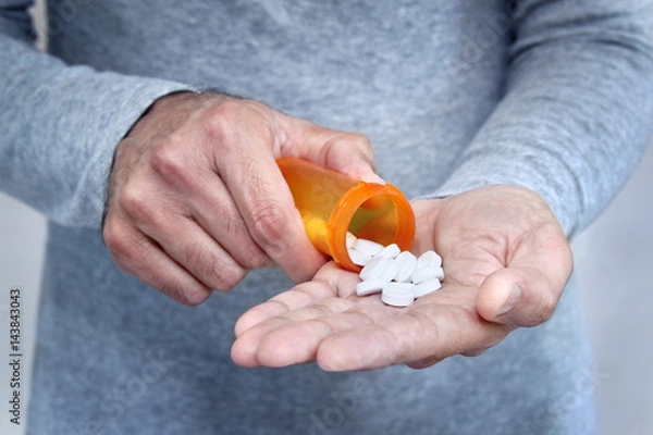 Obraz Man taking pills