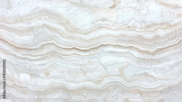Fototapeta A textured surface with a repeating pattern of white, beige, and brown hues.
