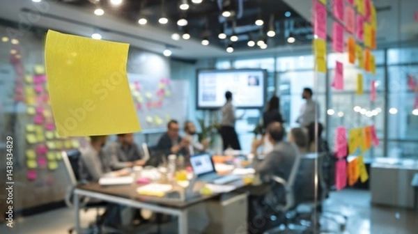 Fototapeta Team collaboration in modern office with brainstorming session and sticky notes