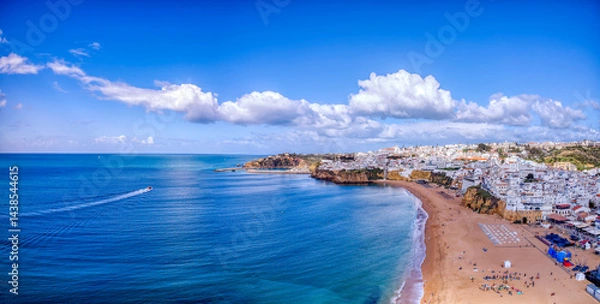 Fototapeta Aerial view of the city of Albufeira and its beach in the Algarve.