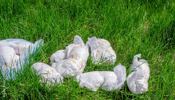 Obraz Diaper waste, dirty diapers. Disposal. The impact of disposable diapers on the environment.