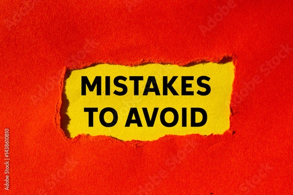 Fototapeta Mistakes to avoid message written on ripped torn red paper on yellow background. Conceptual mistakes to avoid symbol. Copy space.