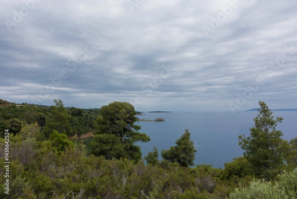 Fototapeta Beautiful scenery by the sea under a cloudy sky in Sithonia, Chalkidiki, Greece