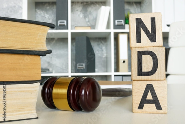 Obraz Non-disclosure agreement NDA and gavel. Confidentiality protection.