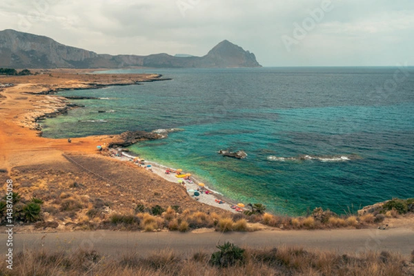 Fototapeta Panoramic view of Caletta del Bue Marino, San Vito Lo Capo,  Spiaggia di Isulidda, Trapani, Sicily, Italy. Dramatic clouds.