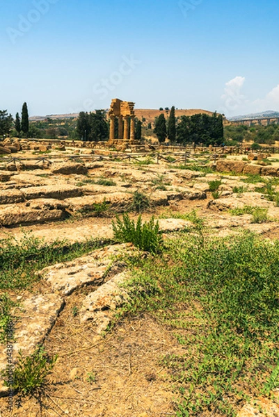 Fototapeta Agrigento, Sicily. Temple of Castor and Pollux one of the greeks temple of Italy, Magna Graecia. The ruins are the symbol of Agrigento city.