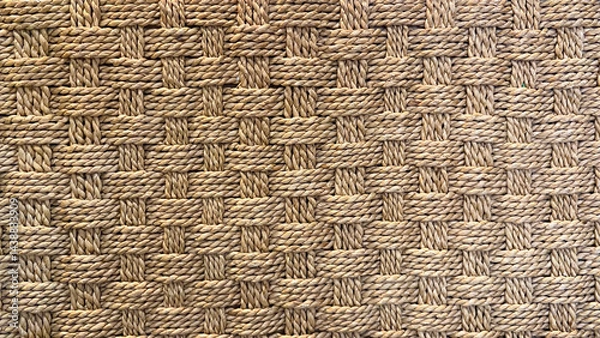 Fototapeta Close-up shows an intricate woven fiber pattern, a textured background.