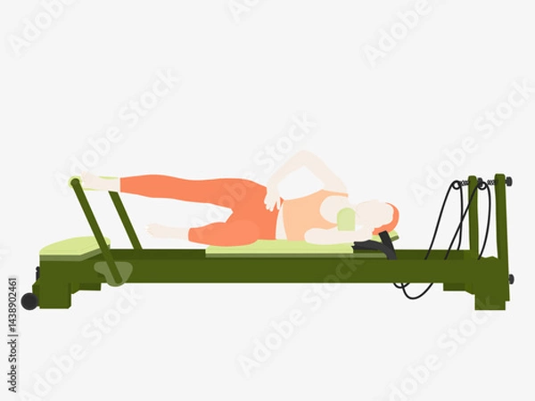 Fototapeta A woman who is lying on her shoulder and doing Pilates Reformer exercises