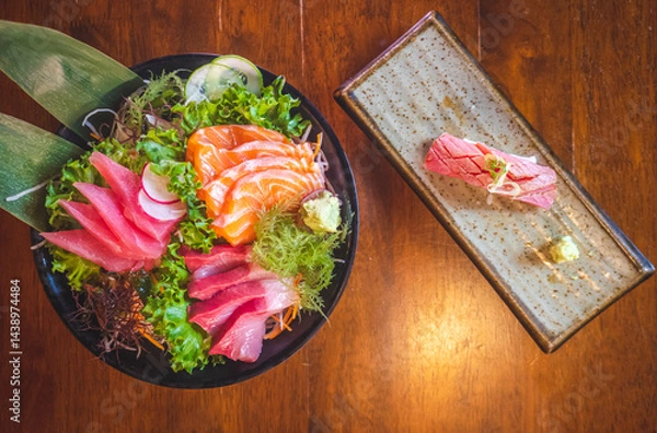 Obraz Savoring fresh sushi and sashimi platter in a cozy restaurant culinary delight indoor overhead view gourmet experience