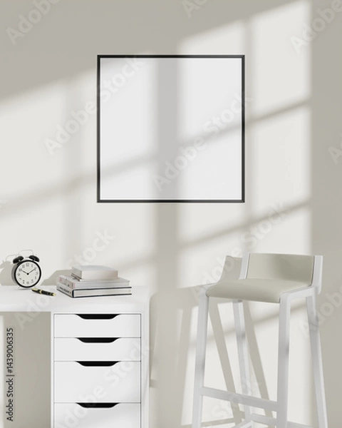 Fototapeta Bright and spacious minimalist room with a blank picture frame on the wall.