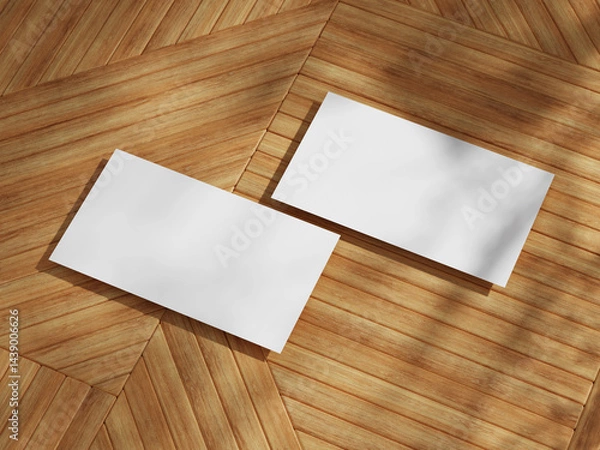 Fototapeta Professional business card mockup on wooden surface with sharp diagonal lines and clean white space for branding.