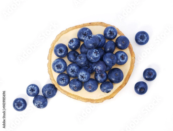 Obraz Blueberries in wooden tray isolated on white background