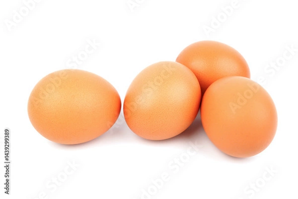 Fototapeta Four fresh chicken eggs on a white background