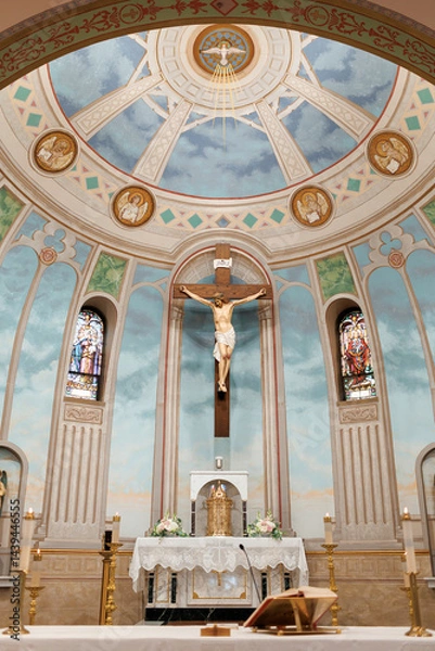 Obraz Church interior with crucifix and figure of Christ under dome. Photo of Christian church inside with stained glass windows in daylight. Religion and faith, Catholicism