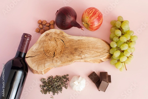 Obraz Products containing polyphenols in their composition. Grapes, onions, garlic, chocolate, tea, nuts, apple close-up on a light background, flat lay