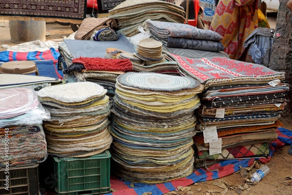 Fototapeta rent a carpet stall at banana festival in baga goa