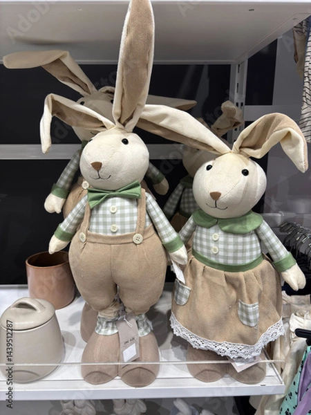 Fototapeta Toy hares on a shelf in a store