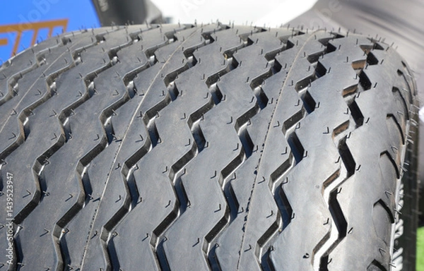 Fototapeta Close up on texture of new truck tire tread
